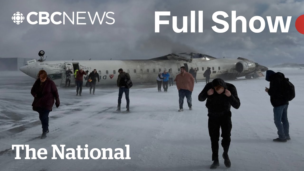 CBC News The National Plane crashes, flips over at Toronto airport