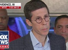 Officials say person of interest in custody after deadly Brown University shooting